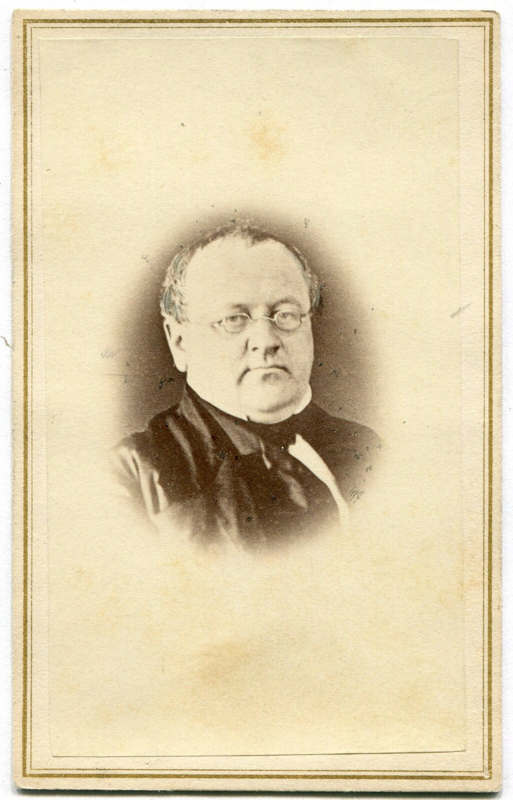 ROUND FACED ORDER MAN W/GLASSES. CDV.