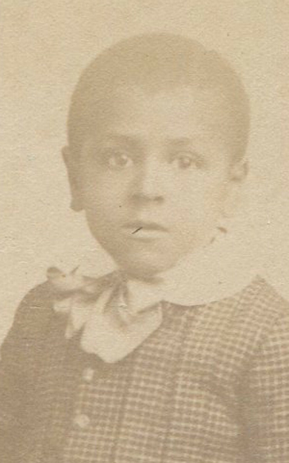 AFRICAN AMERICAN CHILD IN CHECKED OUTFIT W/BOW TIE. CABINET CARD. ALBANY, N.Y.