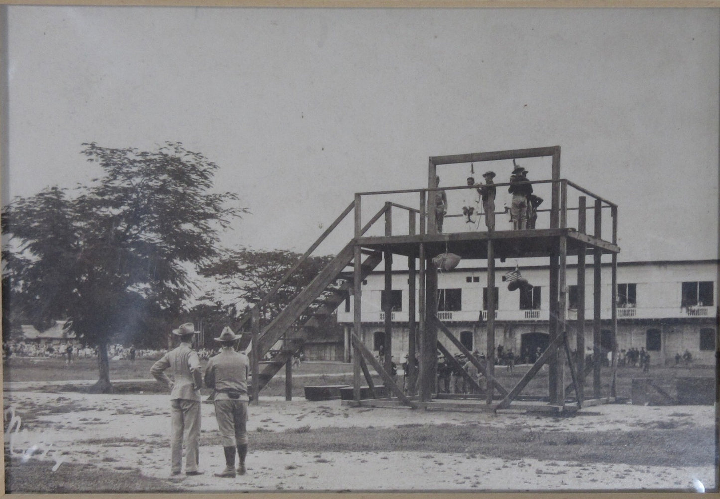 MILITARY GALLOWS, HANGING OF TWO MEN. 5X7 B&W ON 7X9 CARD.
