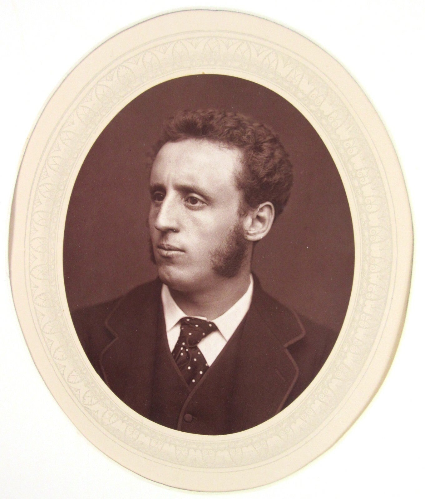 WALTER W. OULESS. 4.5X3.5 OVAL WOODBURYTYPE ON 11.25X8.5 INCH PAGE IN 11X14 MAT.