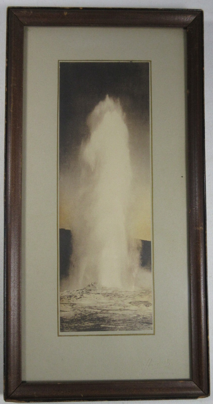 OLD FAITHFUL BY FRANK J. HAYNE. 9X3 TONED SILVER PRINT, 11.75X5.75 MAT/FRAME.