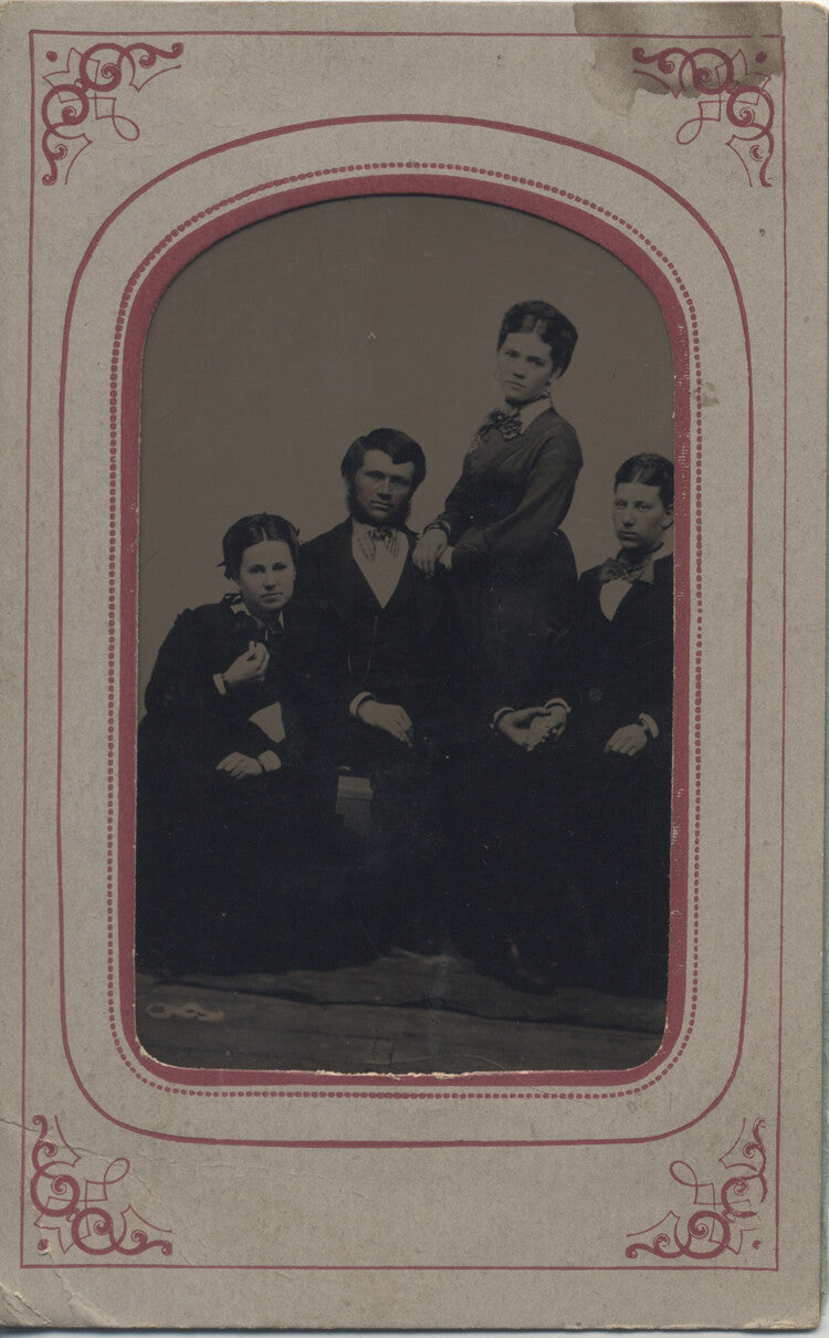 PORTRAIT OF WELL-DRESSED MAN W/ WIFE AND TWO DAUGHTERS