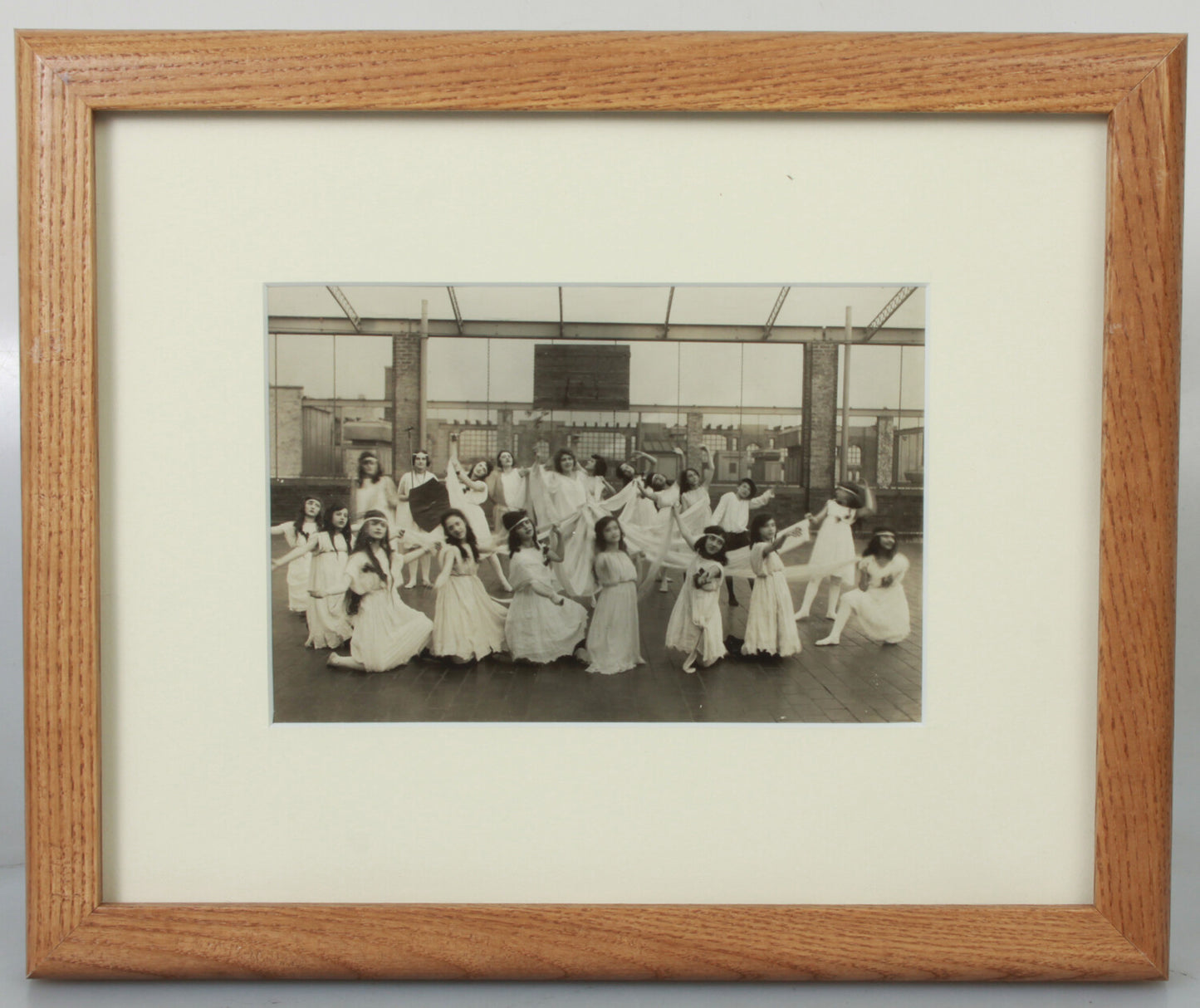 YOUNG WOMEN AND GIRLS DANCE ON ROOFTOP. 4X6.5 SILVER PRINT IN 8X10 FRAME.