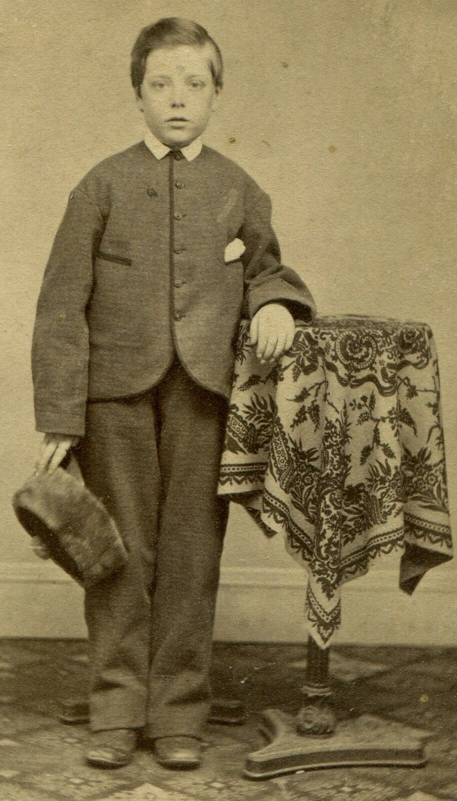 BOY IN LOOSE SUIT, BIG HAT IN HAND. CDV.