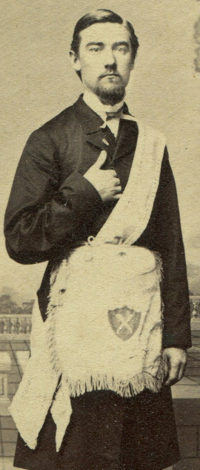 MAN, NAPOLEON POSE, SACK W/CROSSED SWORDS EMBLEM. CDV, PAINTED BACKGROUND.