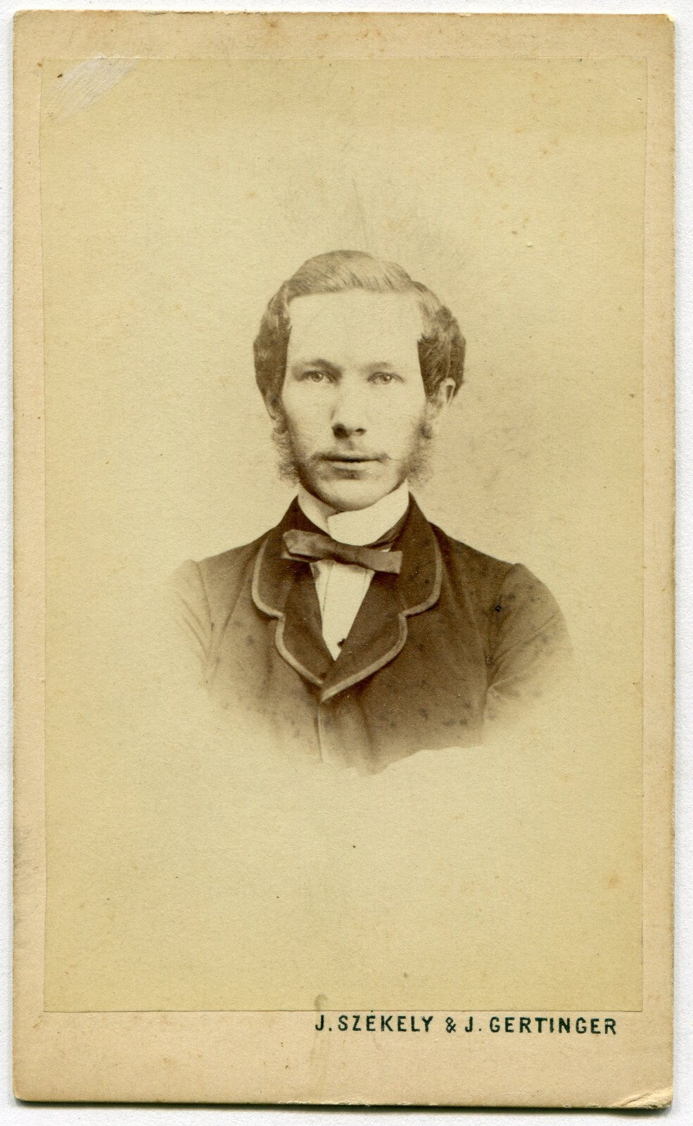 MAN W/SHY WHISKERS, BOW TIE. CDV. WIEN, AUSTRIA.