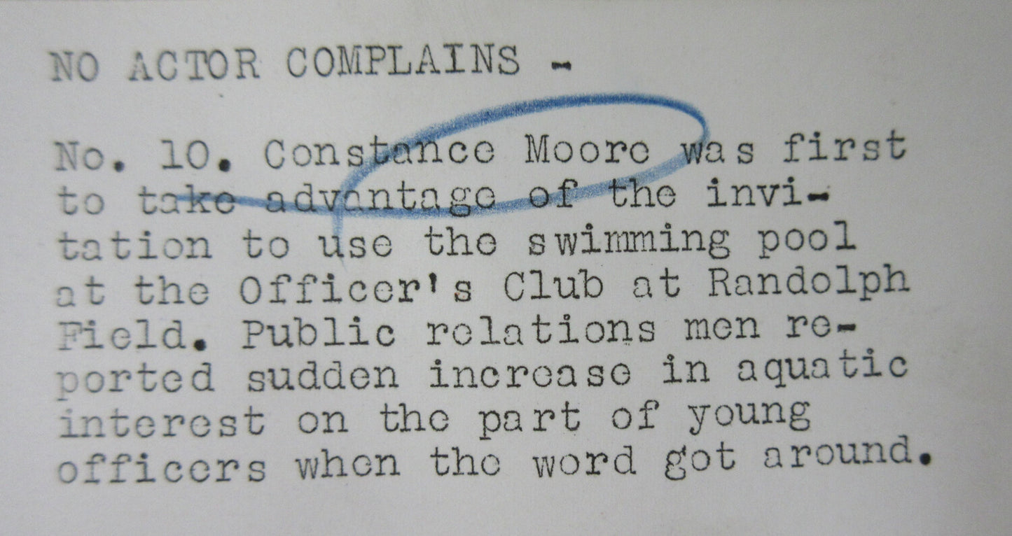 ACTRESS CONSTANCE MOORE SITTING ON DIVING BOARD. 8X10 B&W IN 11X14 ARCHIVAL MAT.