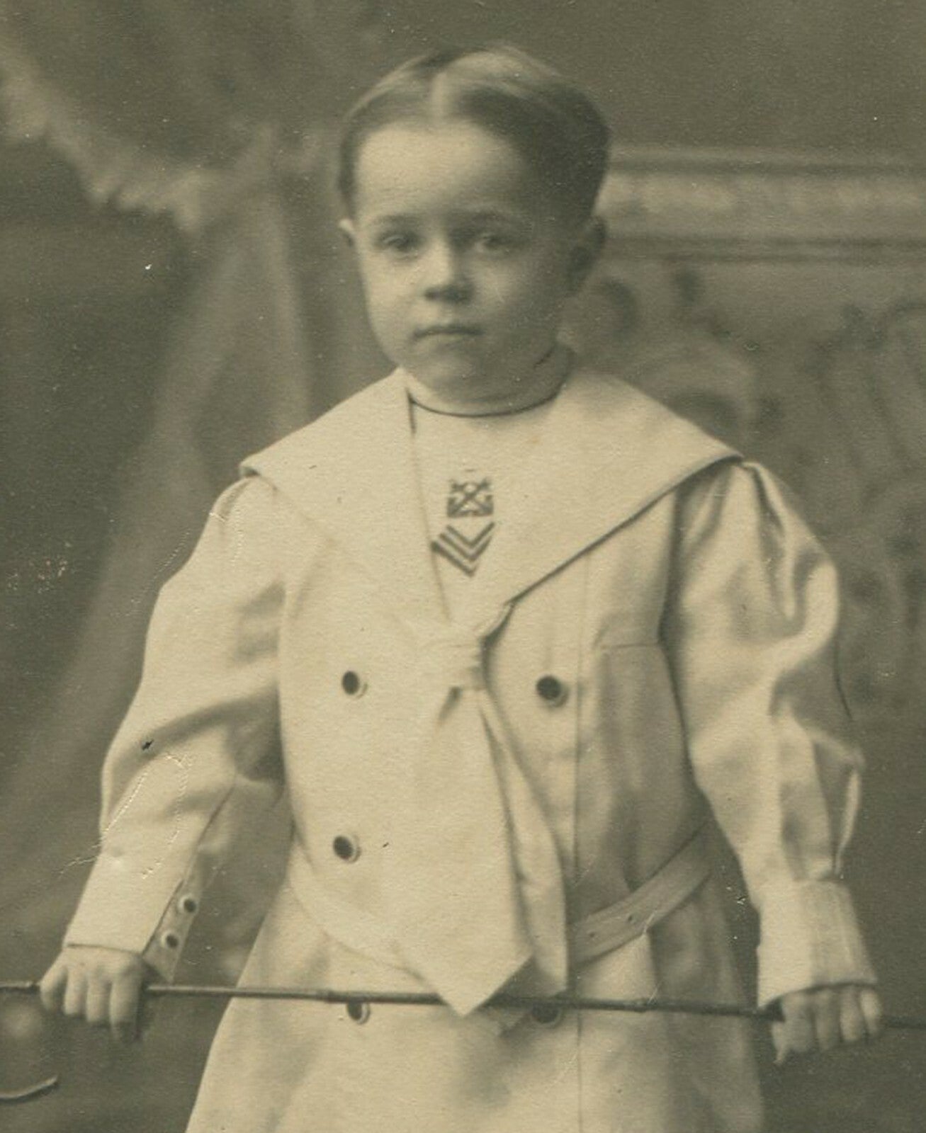 YOUNG BOY IN FANCY SAILOR OUTFIT, HOLDING CANE. 5.5X4 TONED SILVER PRINT