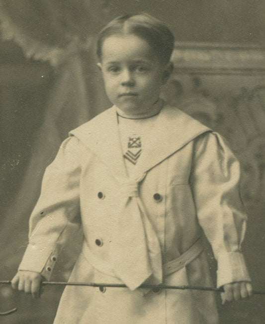 YOUNG BOY IN FANCY SAILOR OUTFIT, HOLDING CANE. 5.5X4 TONED SILVER PRINT