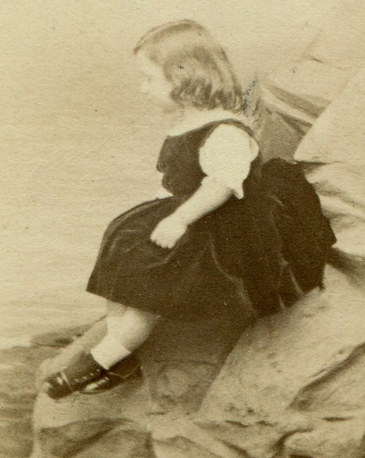 YOUNG GIRL POSED IN STUDIO SETTING/SITTING ON ROCKY BEACH. VERY UNIQUE. CDV.