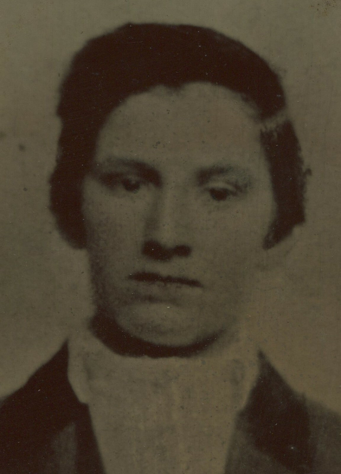 YOUNG MAN, SAD BLANK STARE. TINTYPE 8.5X6.5 IN.