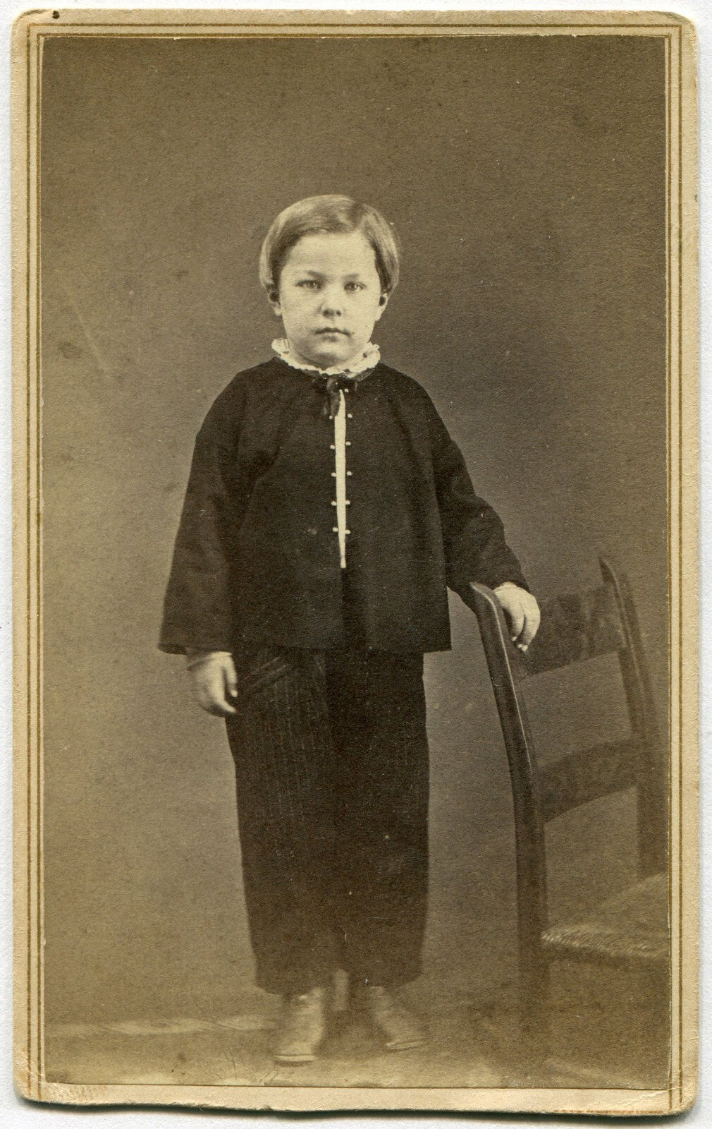 ROBERT PALMER, YOUNG BOY, STYLISH OUTFIT. STANDING POSE AT SMALL CHAIR. CDV.