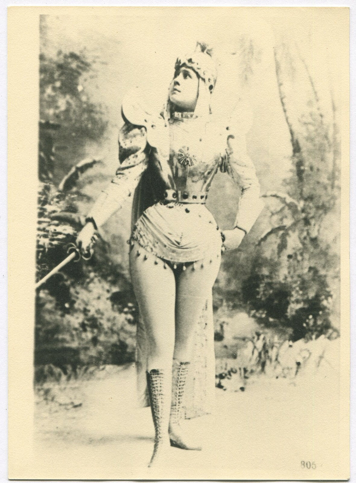 WOMAN W/ SWORD, IN THEATRICAL COSTUME. B&W PHOTO