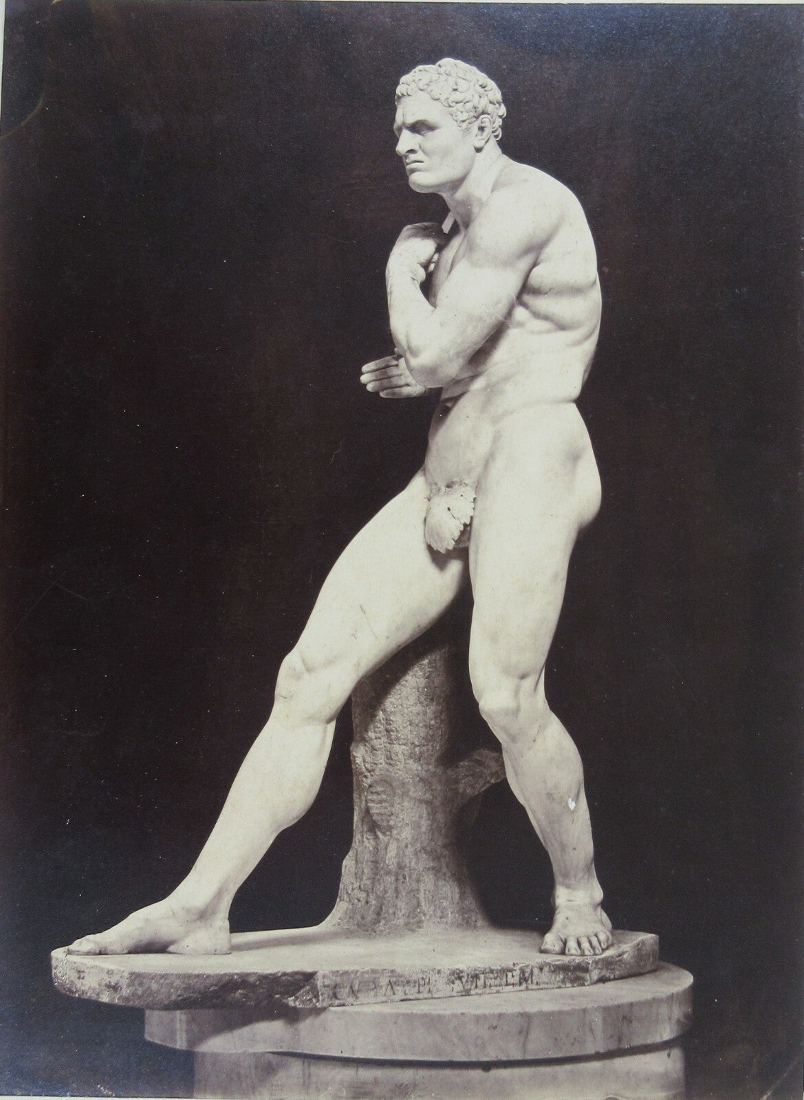 WRESTLER, SCULPTURE. 10X7.5 INCH ALBUMEN ON 19.25X12.5 INCH CARD.