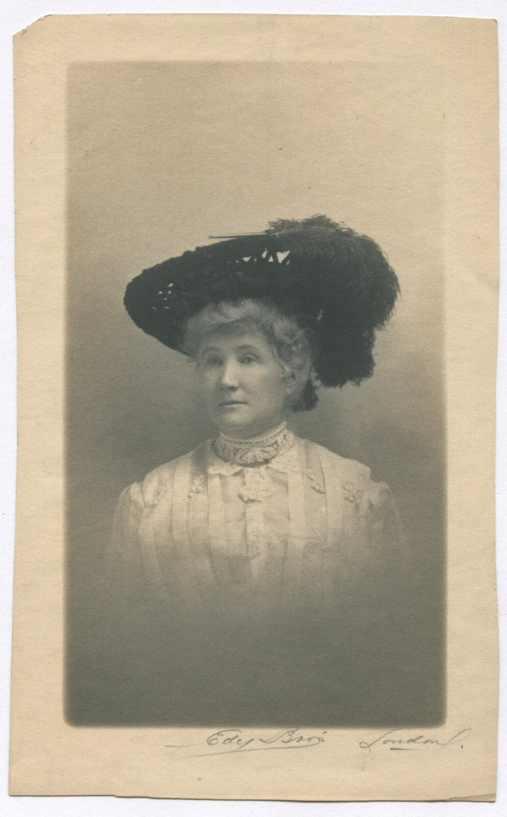 WOMAN IN ORNATE HAT. 7.25X4.5 PHOTOGRAVURE. LONDON. PHOTOGRAVURE.