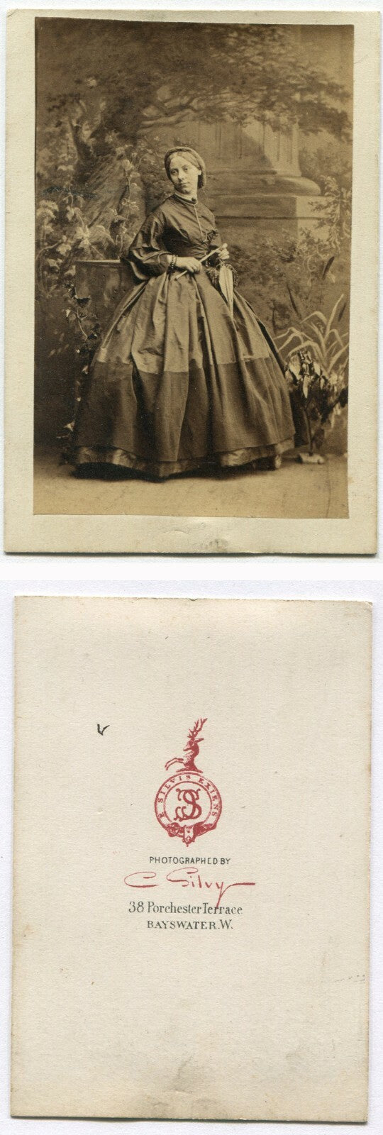 YOUNG WOMAN HOLDING PURSE ON A STICK. RICHLY PAINTED BACKGROUND. CDV. BAYSWATER.