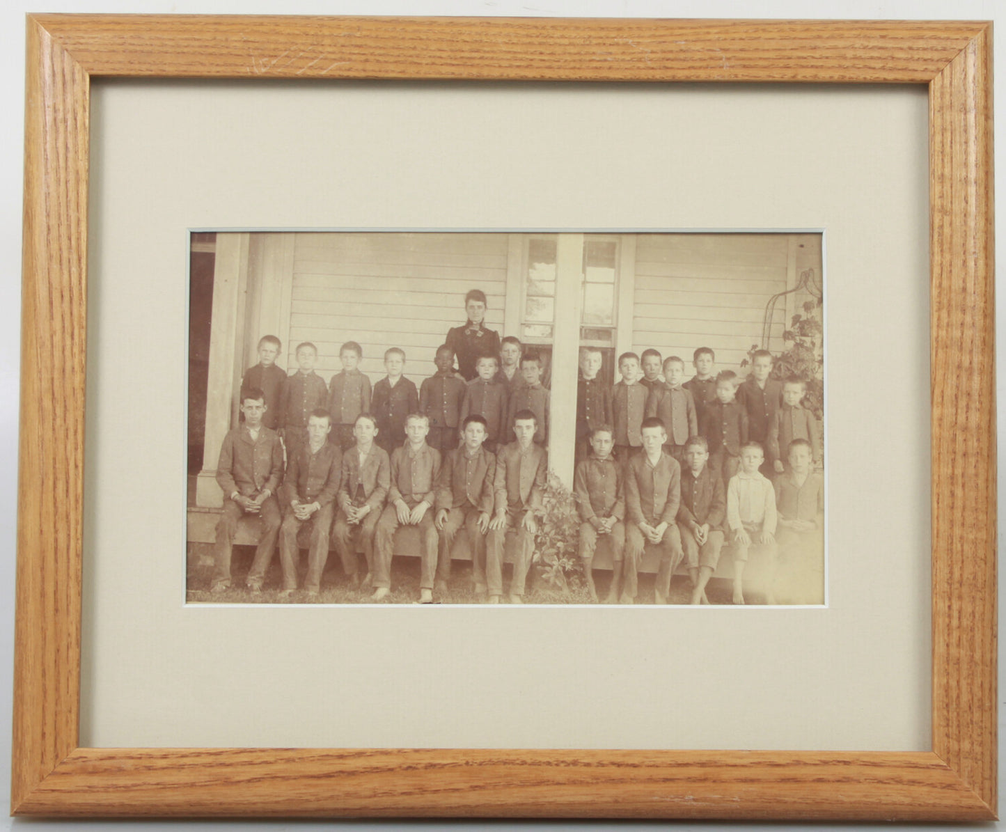 BOYS SCHOOL CLASS PHOTO IN FRONT OF SCHOOL. 8X10 FRAME, ARCHIVAL MATTING.
