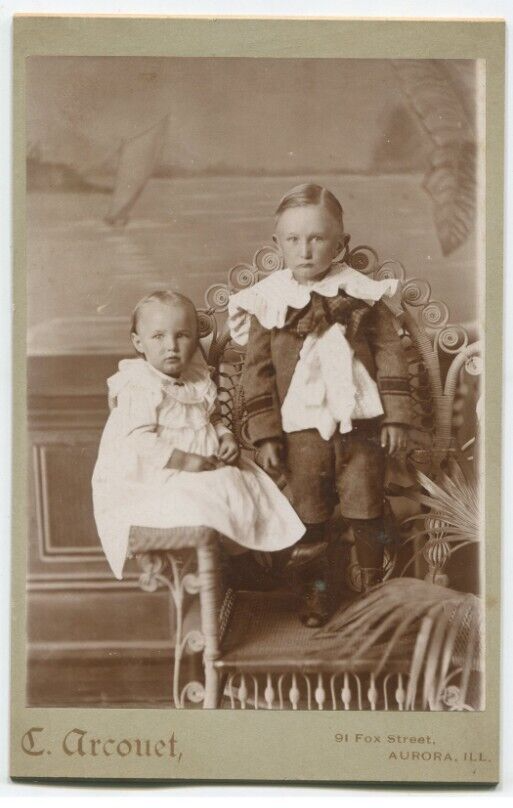 SIBLINGS, FANCY OUTFITS. THESE TWO ARE UP TO SOMETHING. CABINET CARD.AURORA, ILL