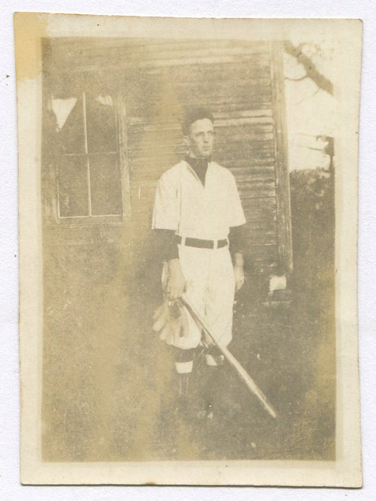 BASEBALL PLAYER IN UNIFORM. TONED SILVER PRINT 3.25X2.25. 1920-30s.