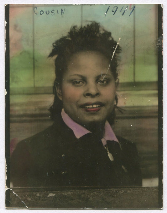 AFRICAN AMERICAN WOMAN, SMILING. 4.25X3.25 INCH, TINTED SILVER PRINT. 1940s.