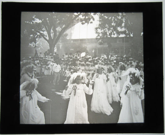 YOUNG WOMEN PARTICIPATE IN CULT CEREMONY. LANTERN SLIDE.