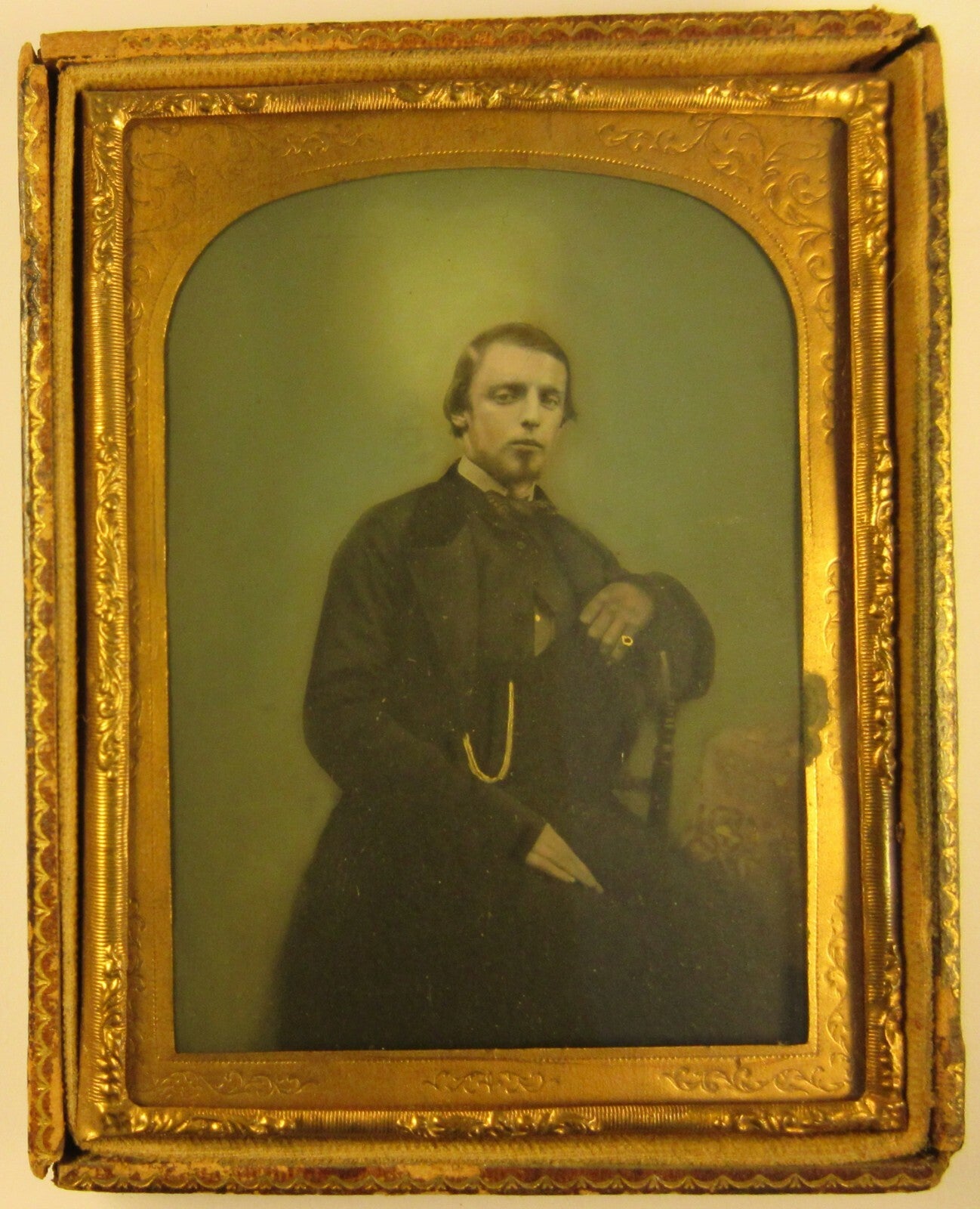 MAN W/SOUL PATCH. RICHLY TINTED 4TH PLATE AMBROTYPE. HALF CASE.