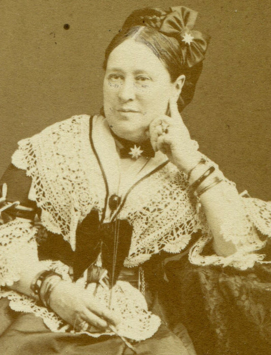 WOMAN IN VERY BUSY OUTFIT, LACE TRIM, NECKLACE, HAIR BOW. CDV. LONDON, ENGLAND.