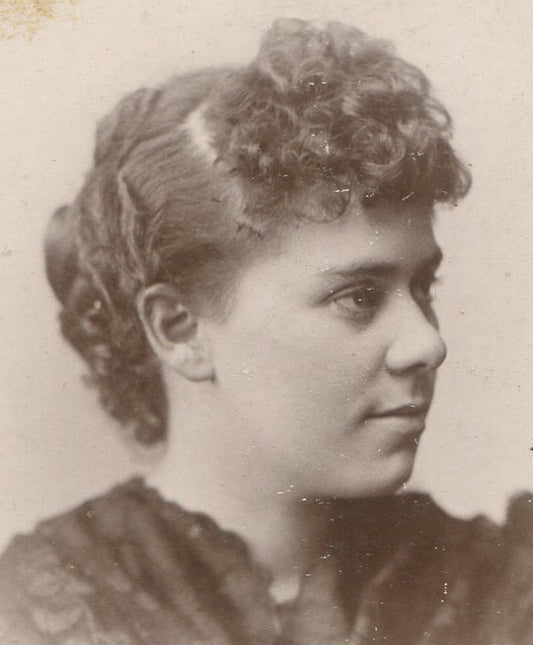 WOMAN, CURLY HAIR, PROFILE POSE. CABINET CARD. CLEVELAND, OHIO.