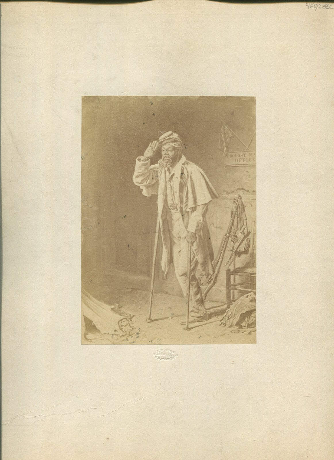 AFRICAN AMERICAN CIVIL WAR SOLDIER. WOUNDED SOLDIER ON CRUTCHES, SALUTES.