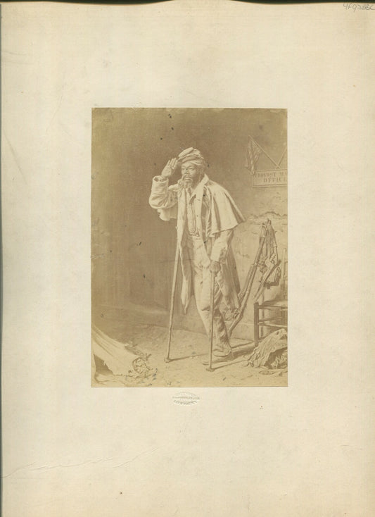AFRICAN AMERICAN CIVIL WAR SOLDIER. WOUNDED SOLDIER ON CRUTCHES, SALUTES.