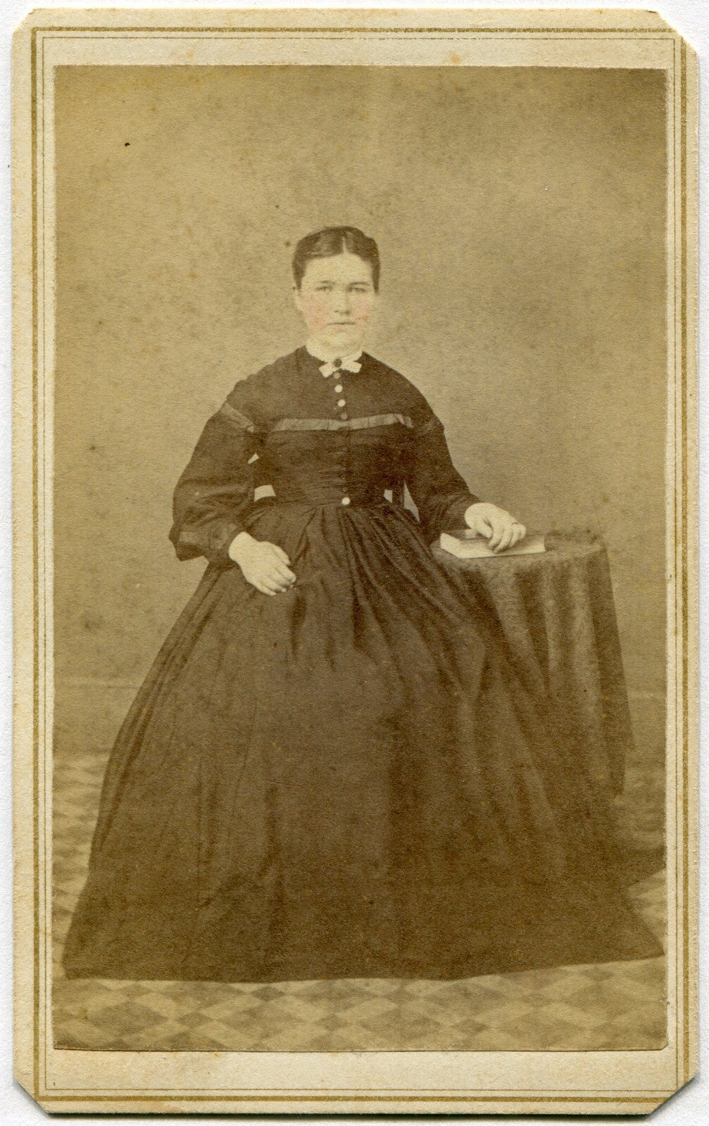 SARAH BROWER SEATED AT TABLE W/BOOK. TINTED CDV. PILLOW, PA.