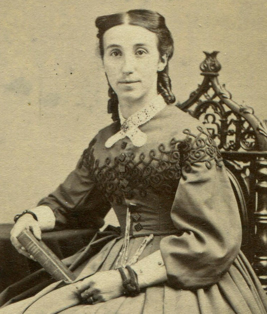 LONG FACED, FLAT HEADED WOMAN, HOLDING BOOK. CDV. ST. JOHN, NEW BRUNSWICK, CAN.