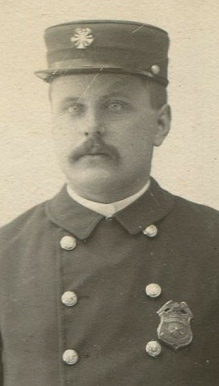 FIREMAN IN UNIFORM. B&W PHOTO W/PAINTED BACKGROUND.