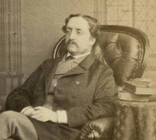 DISTINGUISHED GENTLEMAN SEATED POSE, BOOKS ON TABLE. CDV. LONDON, ENGLAND.