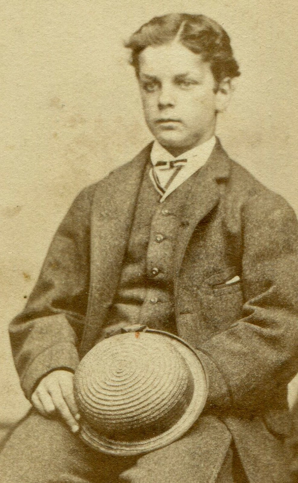 YOUNG MAN IN CRISP NEW SUIT, HOLDING STRAW HAT.  CDV. ST. JOHN, NEW BRUNSWICK,CA