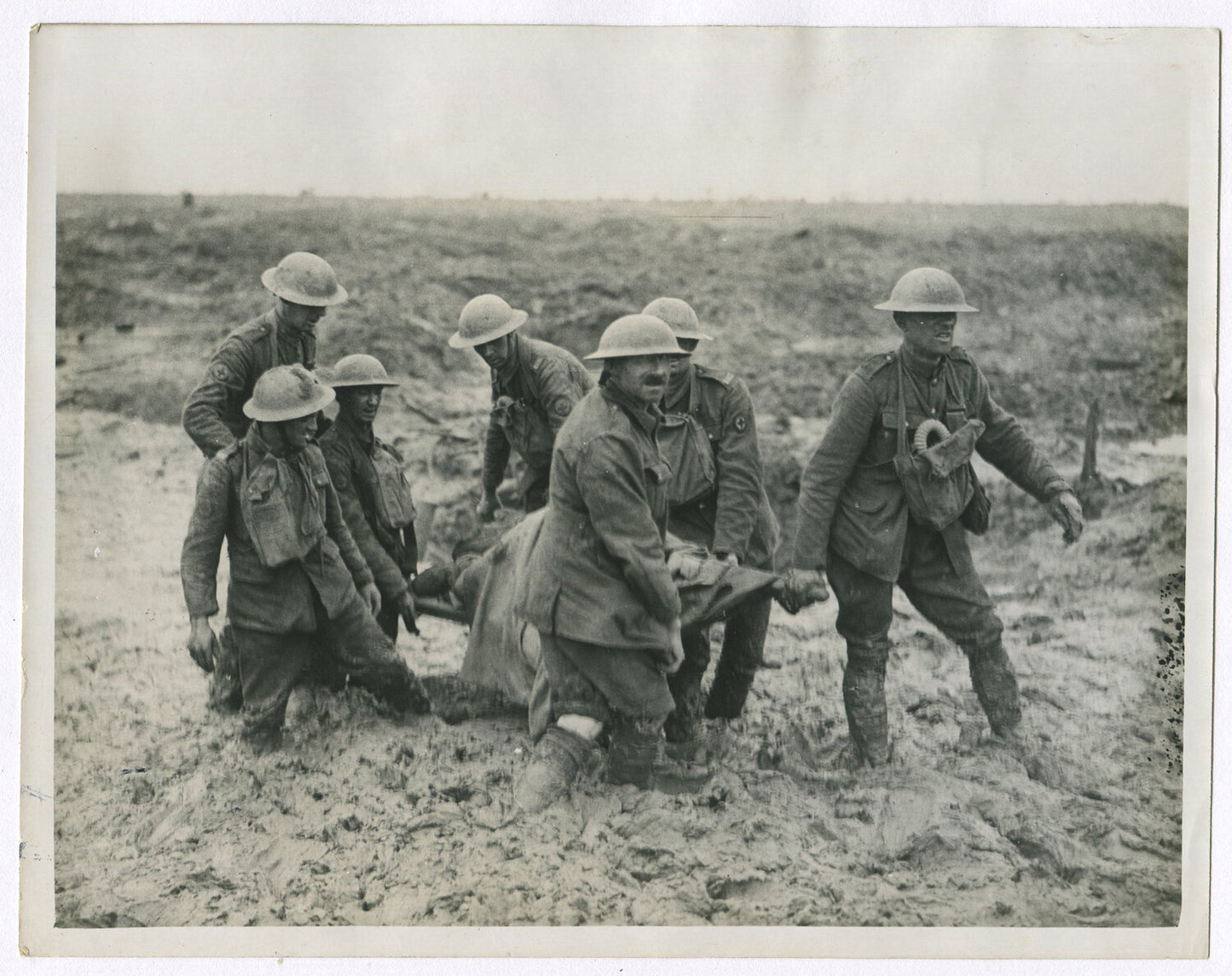BRITISH CARRY WOUNDED ON STRETCHER. FLANDERS DEEP MUD. WWI. (8X10 REPRINT)