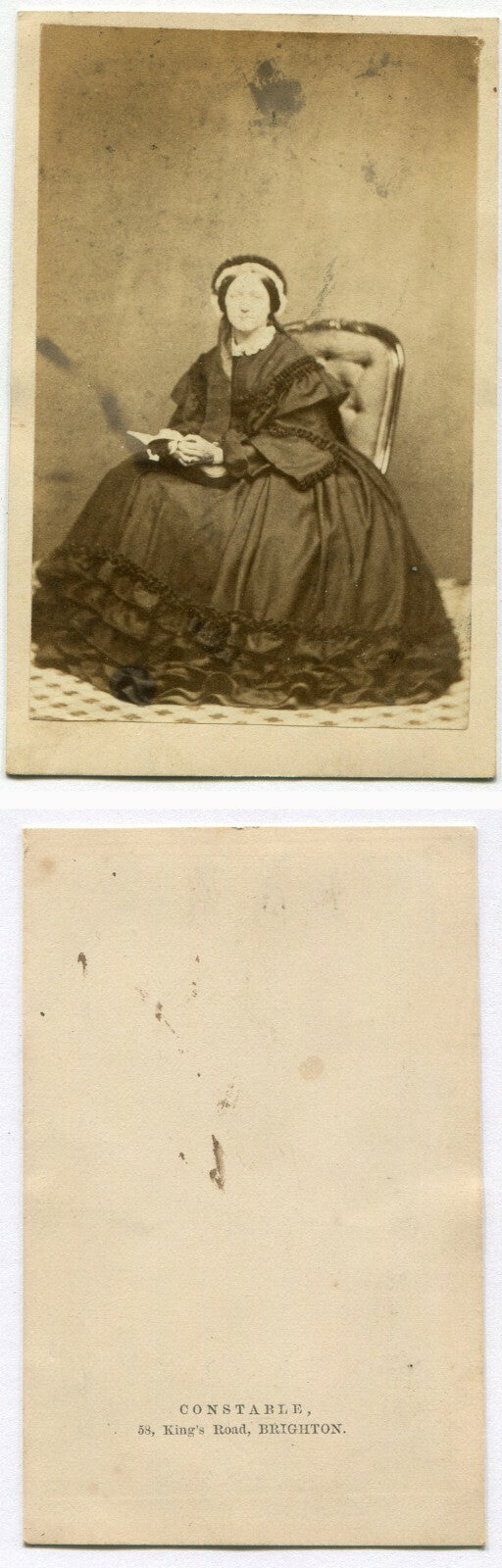 OLD WOMAN POSED W/OPEN BOOK. CDV. BRIGHTON, ENGLAND. MAKER MARK ON CARD BACK.