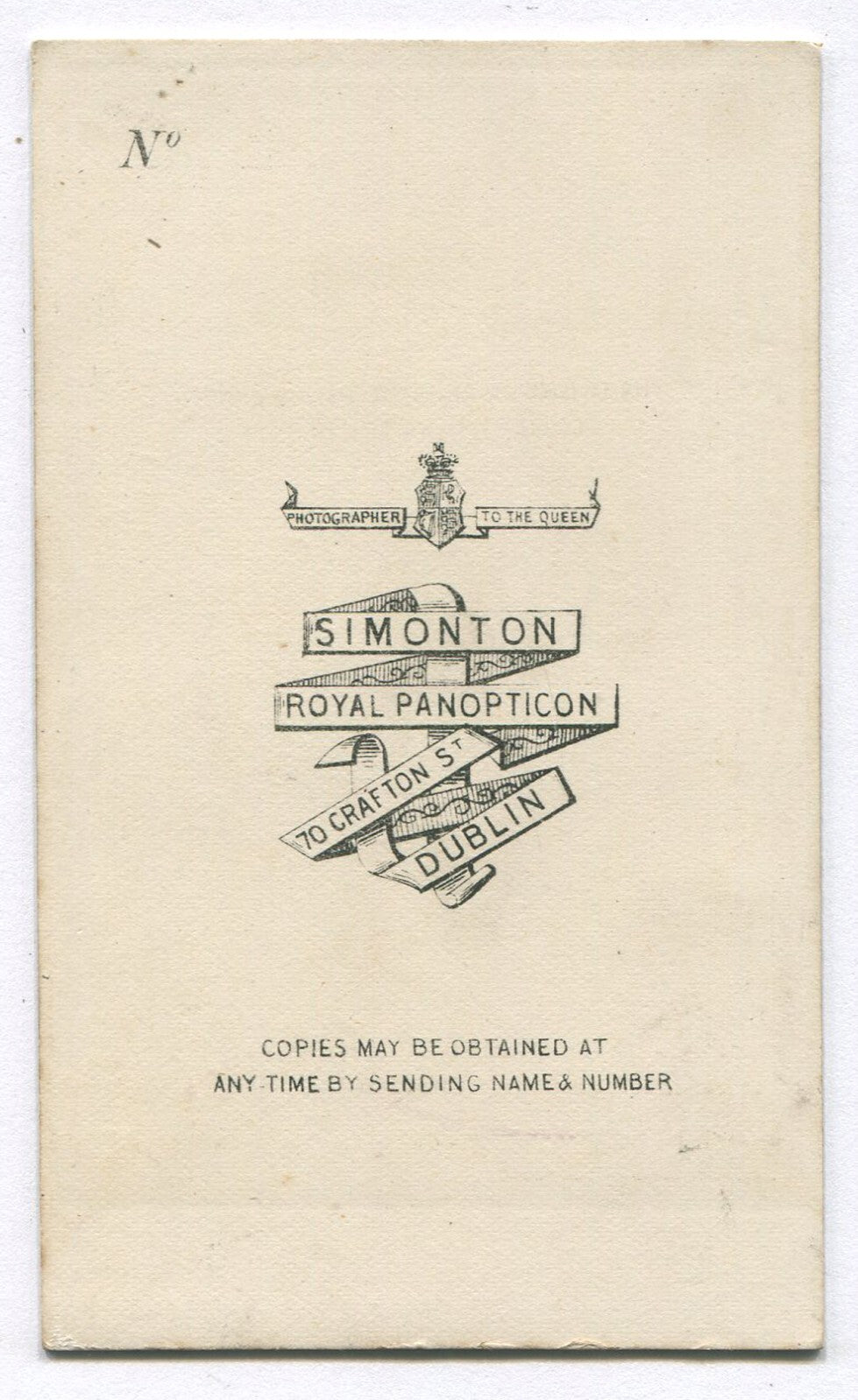 YOUNG BOY WITH WAVY HAIR, HIGH BOOTS AND WOOL HAT. CDV, DUBLIN, IRELAND.