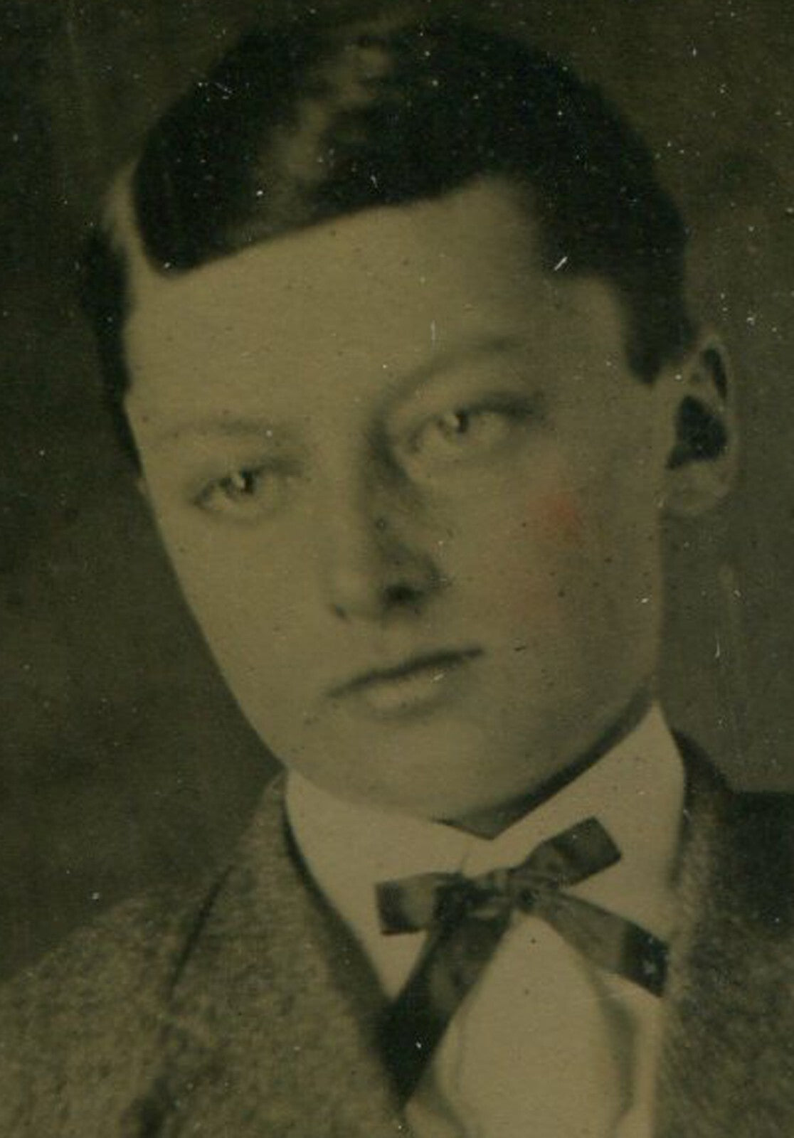 PRETTY BOY. SHARP PORTRAIT, TINTED TINTYPE IN PERIOD PAPER MAT.