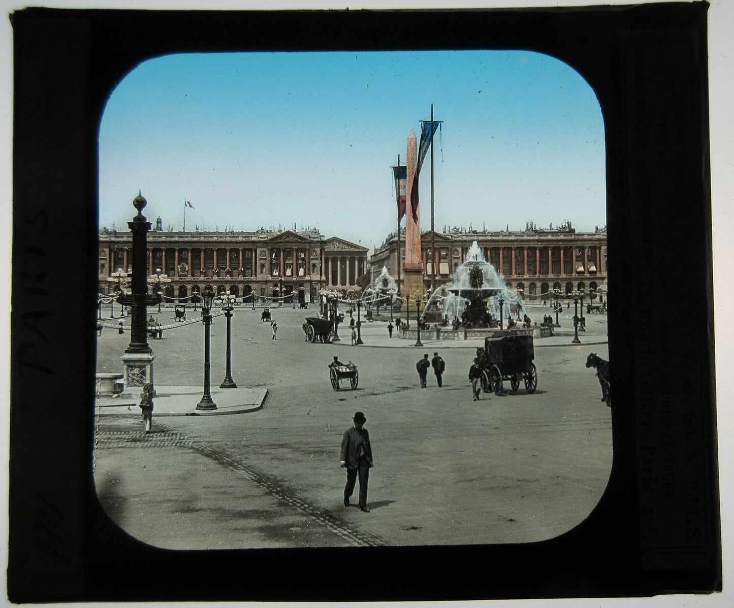 PUBLIC SQUARE. PARIS, FRANCE.  HAND COLORED PHOTO ON GLASS.