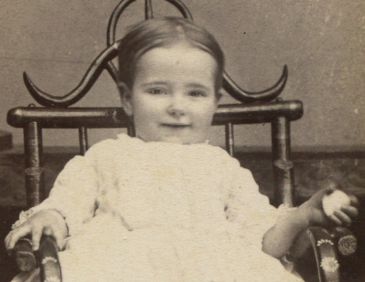 SMILING TODDLER POSED HOLDING BALL. CDV. WAVERLY, IOWA.