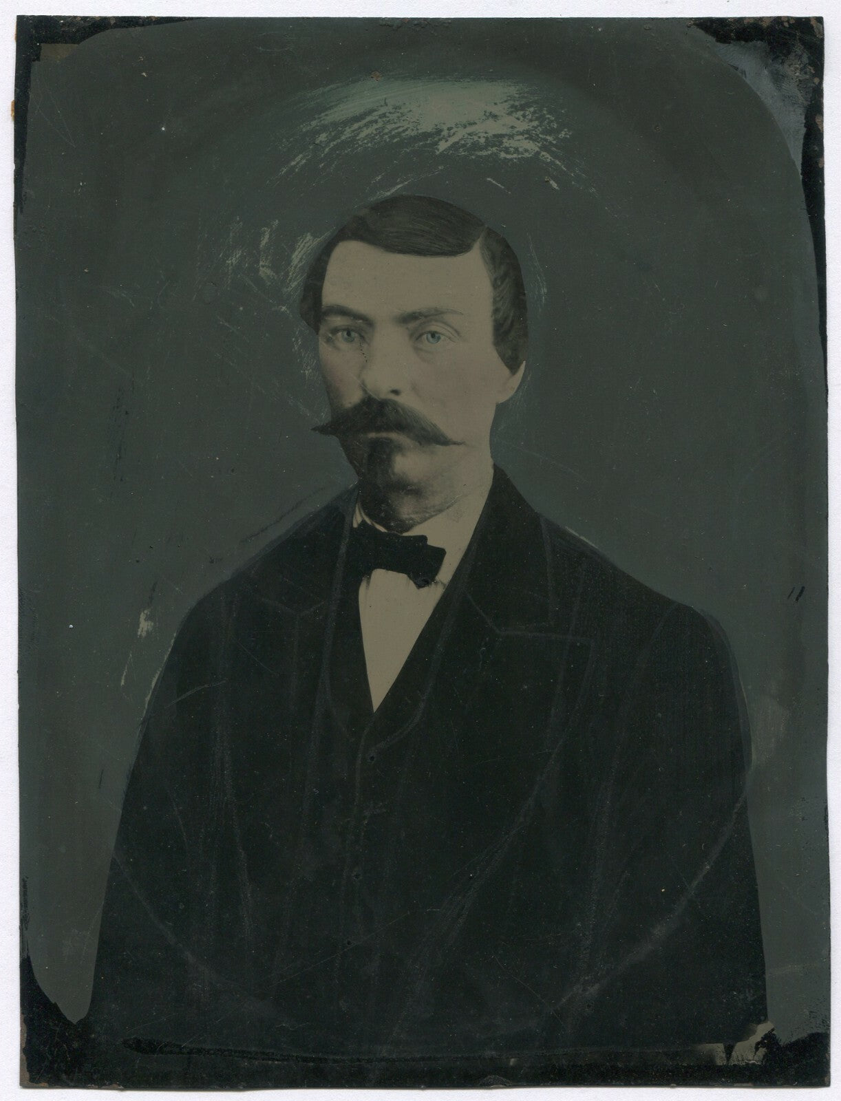MAN W/MUSTACHE AND SOUL PATCH. FOLK ART, PAINTED, TINTED TINTYPE 6.5 X 8.5 IN.