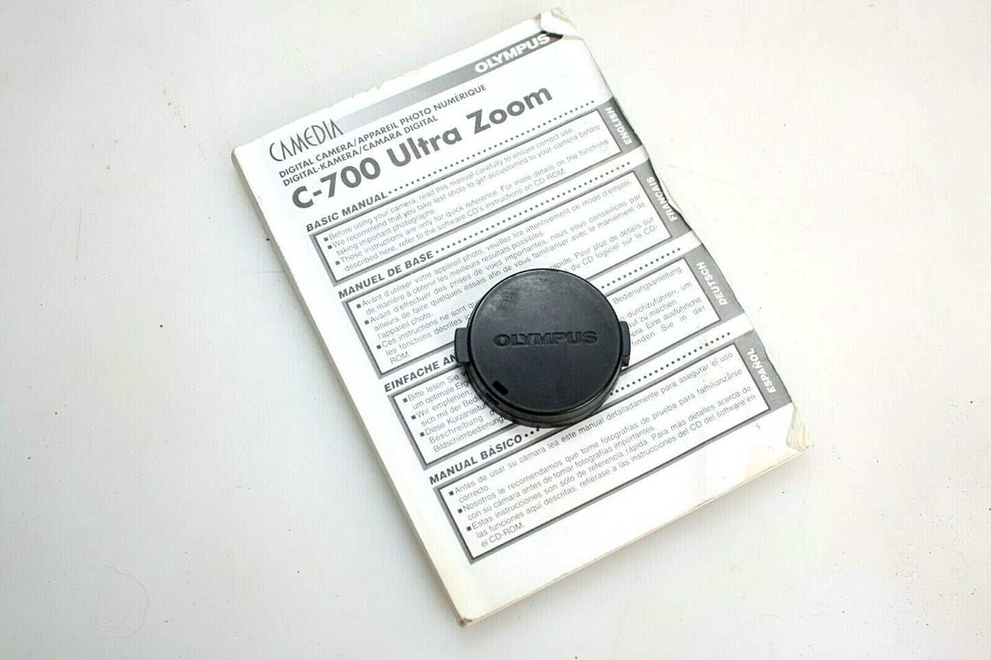 Olympus C-700 Ultra Zoom Instruction Manual and Lens Cap