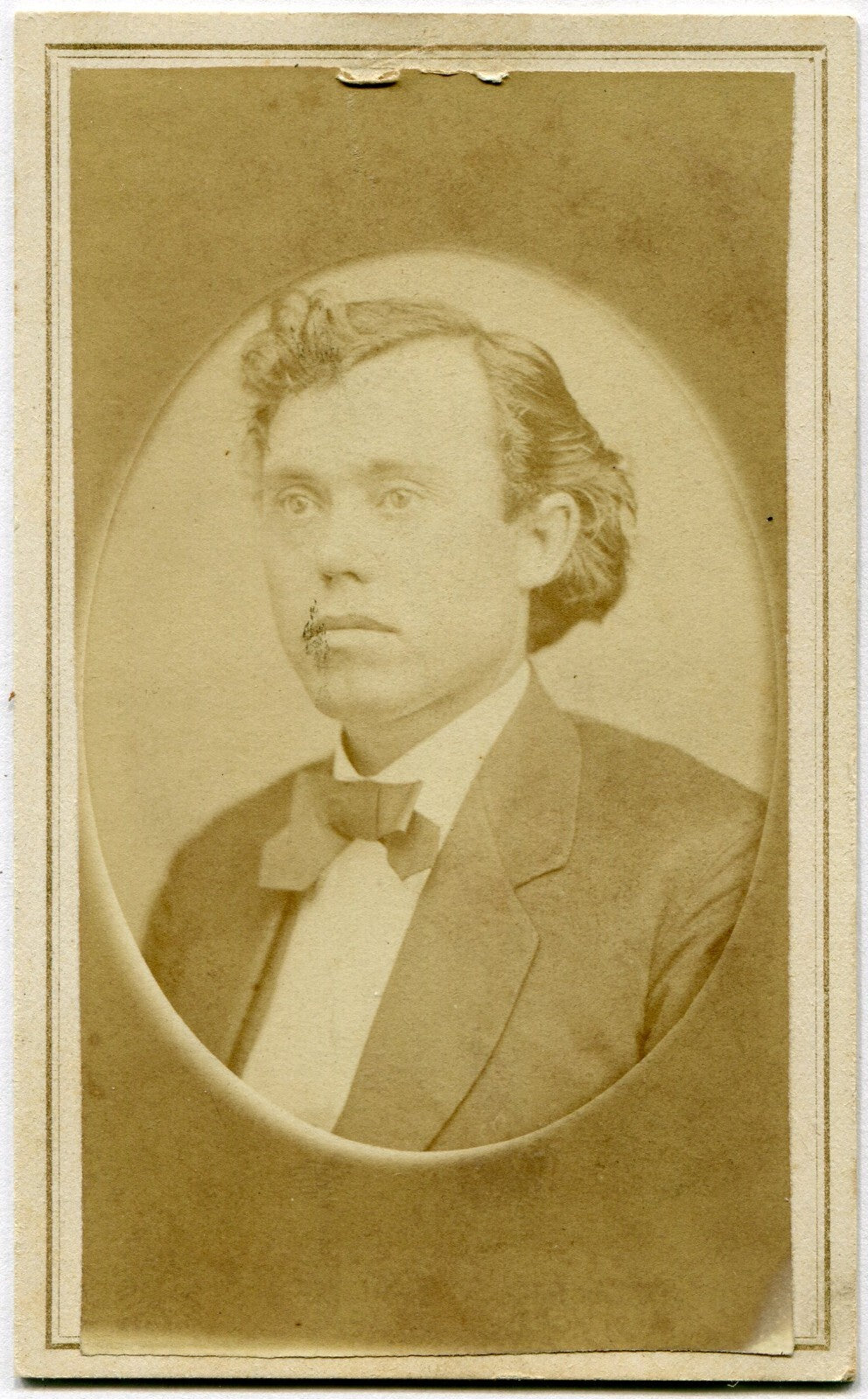 FULL LIPPED MAN IN BOW TIE. CDV. WELLSVILLE, OHIO.