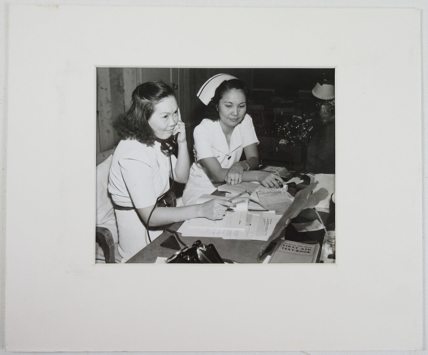 WWII ERA NURSES. 8X10 B&W PRINT IN 11X14 IN ARCHIVAL MAT.