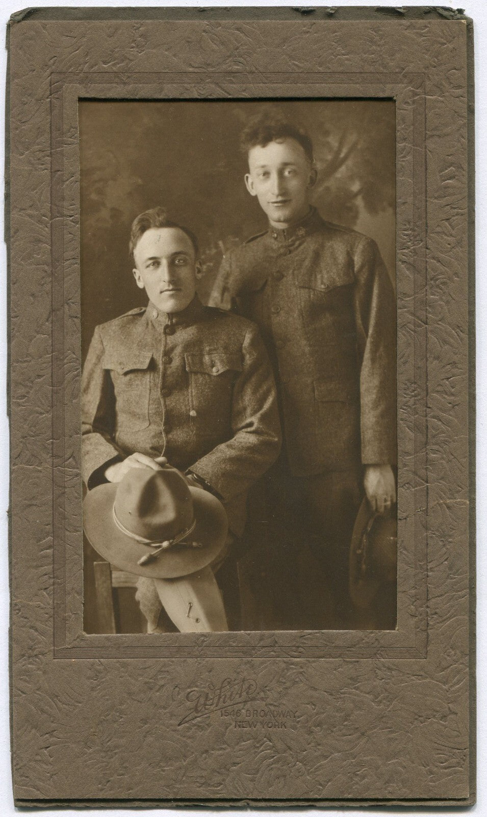 WWI ERA SOLDIERS POSED IN UNIFORM. SEPIA TONED 7.5X4.5 PHOTO.