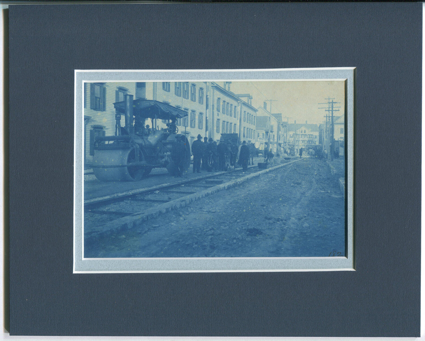OCCUPATIONAL. CYANOTYPE, EARLY STEAMROLLER 4.5X6.5 PHOTO IN 8X10 ARCHIVAL MAT.