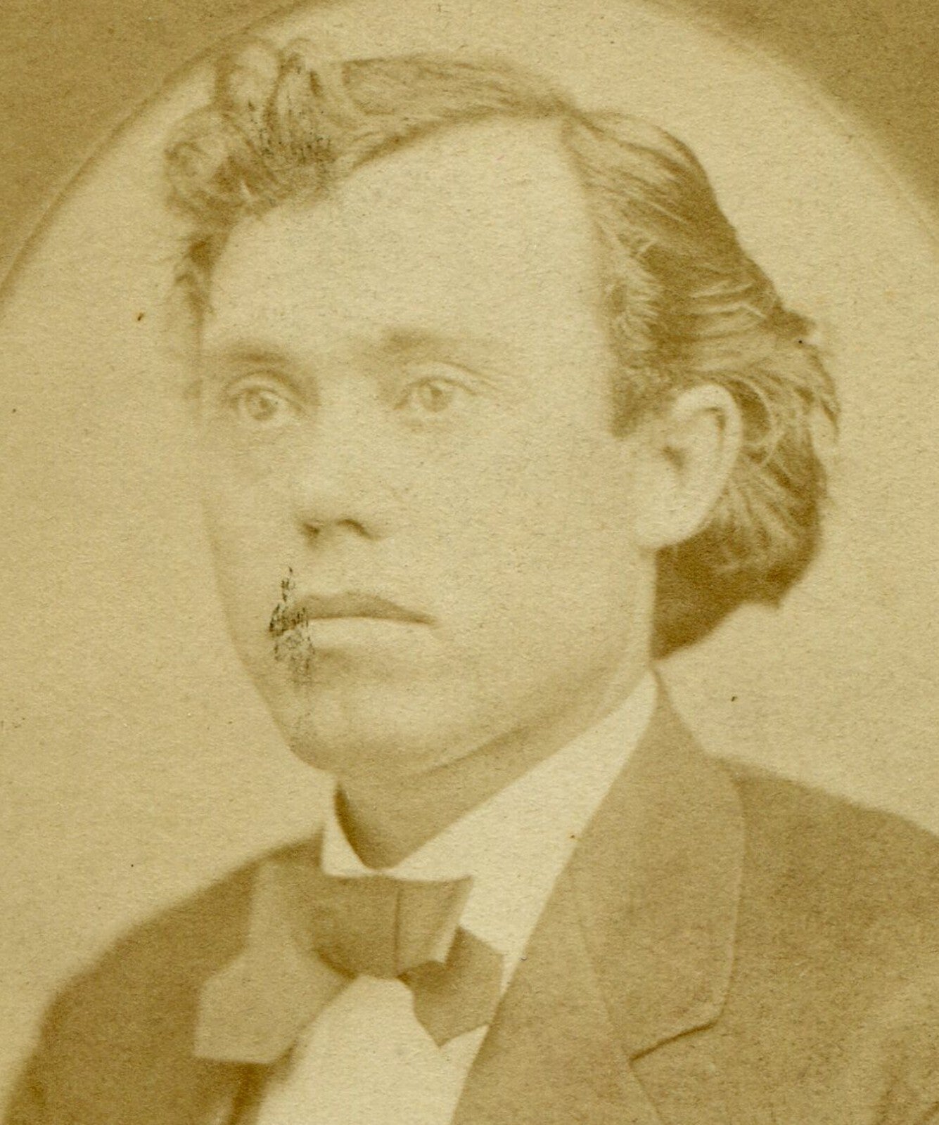 FULL LIPPED MAN IN BOW TIE. CDV. WELLSVILLE, OHIO.
