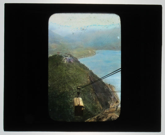 TOP OF SUGARLOAF ON CABLE CAR, RIO DE JANEIRO, BRAZIL.TINTED PHOTO ON GLASS.