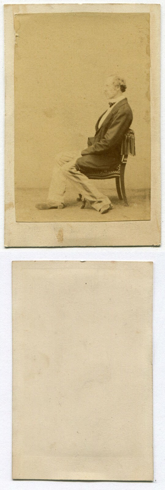 MAN, LAZY PROFILE POSE, FEET/LEGS ODDLY POSITIONED. CDV.